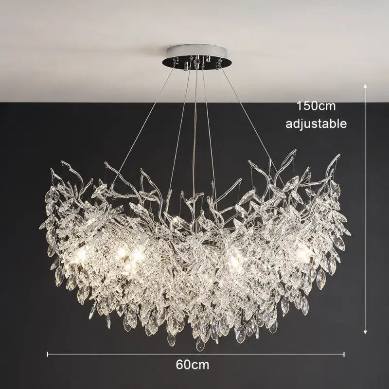 lustre de cristal luxo prata iluminando sala de jantar decorada larmary